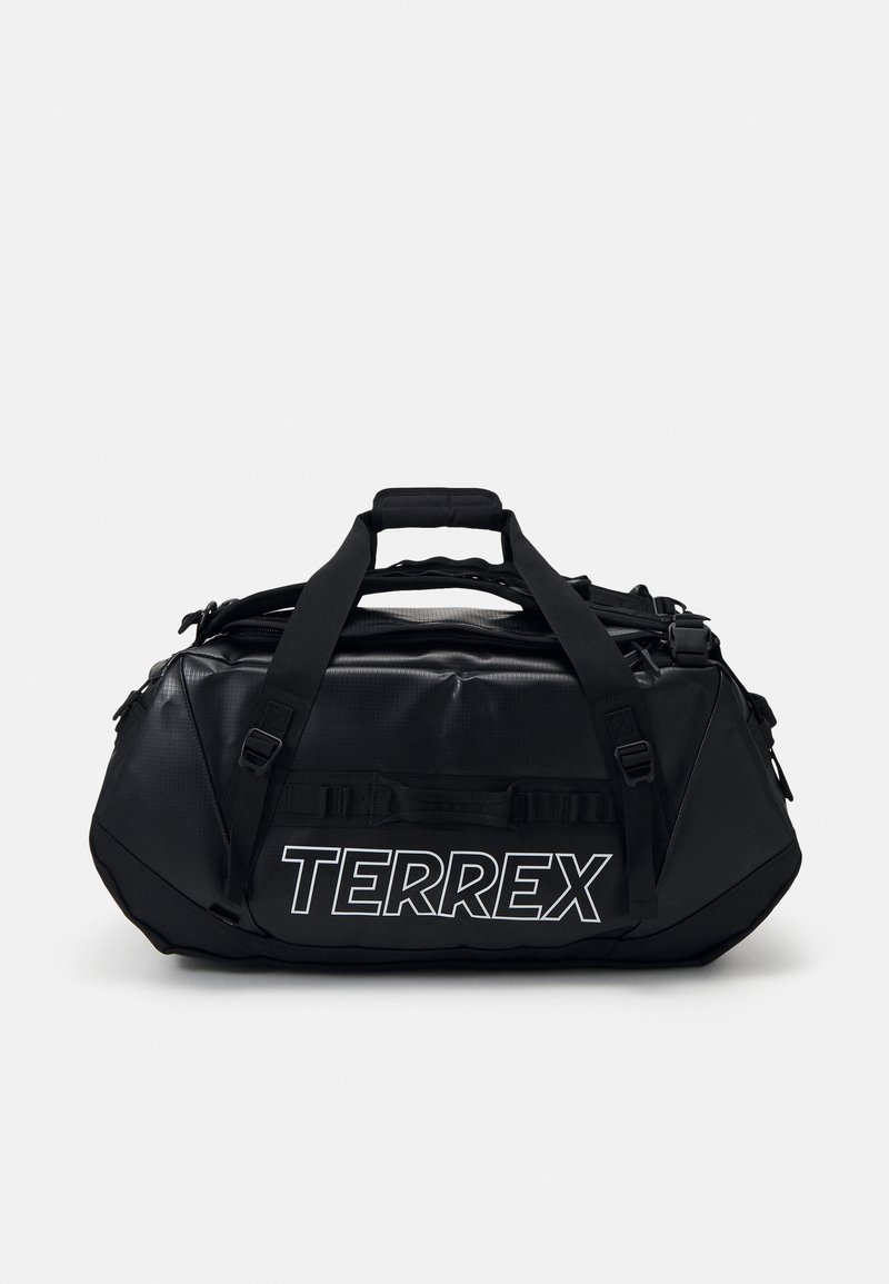 Saco de duffel preto com acabamento texturizado, apresentando alças reforçadas, correias ajustáveis e o logótipo 'TERREX' em letras brancas em negrito.
