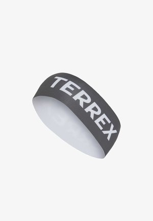 Grijze elastische haarband met de tekst "TERREX" in vetgedrukte witte letters, een gladde textuur, ontworpen voor atletisch gebruik.
