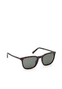 Lunettes de soleil rectangulaires polarisées avec verres foncés et montures en écaille de tortue, présentées sur fond blanc.
