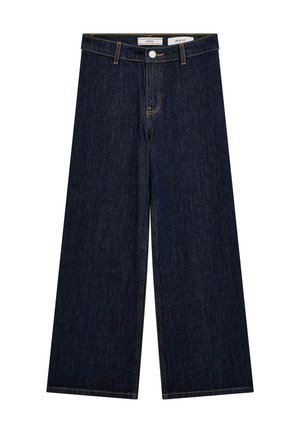 Weite Jeanshosen in Dunkelblau, mit Knopfverschluss und zwei Vordertaschen. Der Stoff ist leicht strukturiert mit sichtbaren Nähten.