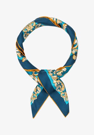 Silk scarf in teal and navy, featuring intricate gold and white floral patterns, tied in a loop with pointed ends and a smooth texture.