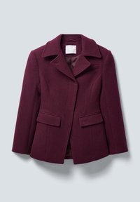 Women's tailored dark purple wool blazer with wide lapels, flap pockets, and a single-breasted design on a light gray background.