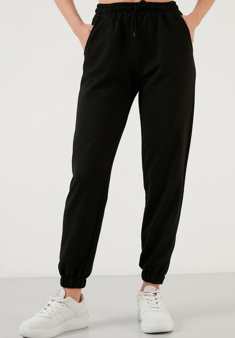 LELA - Tracksuit bottoms - black, Enlarge