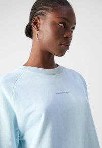 Marc O'Polo DENIM RAGLAN SLEEVES - Melegítőfelső - dawn sky