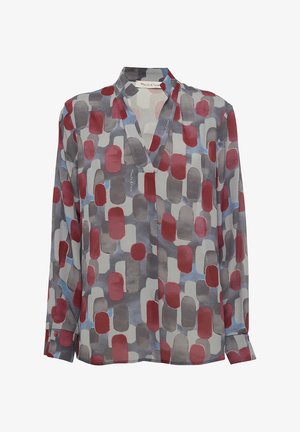 Blouse à manches longues en tissu léger et transparent, présentant une base grise avec des motifs ovales irréguliers rouges et bleus. Comprend un décolleté en V et des poignets boutonnés.