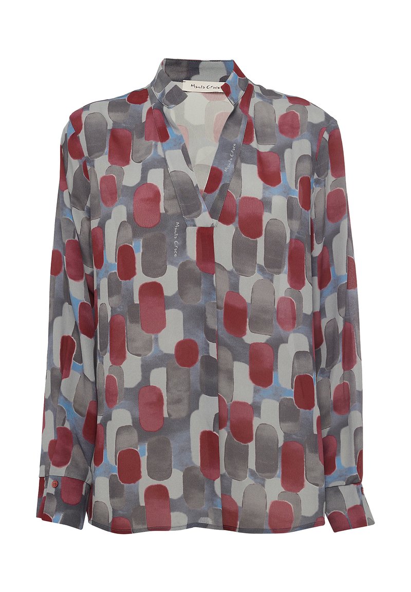 Blusa a maniche lunghe in tessuto leggero e trasparente con una base grigia e motivi ovali irregolari rossi e blu. Include un collarino a V e polsini con bottoni.
