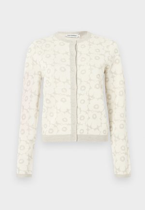 Cream-colored cardigan with long sleeves and beige floral pattern, featuring a round neck and seven front buttons.