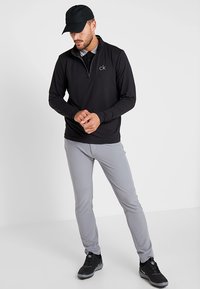 Calvin Klein Golf NEWPORT HALF ZIP - Ilgarankovis viršutinės dalies drabužis - black