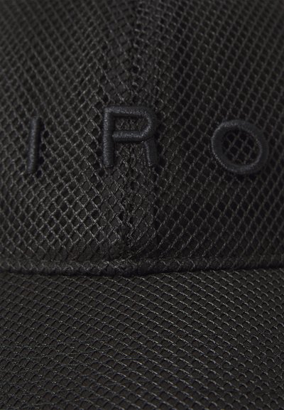 Black textured baseball cap with raised embroidery spelling "IRO" on the front panel above the brim.