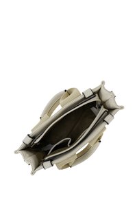 Beige leather handbag with two handles and an open main compartment showing interior zippered and slip pockets.