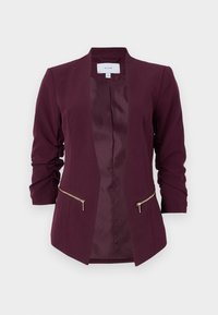 Veste bordeaux à la texture lisse, sans boutons, avec deux fermetures éclair à l'avant. Elle présente des manches trois-quarts et un design à l'avant ouvert.