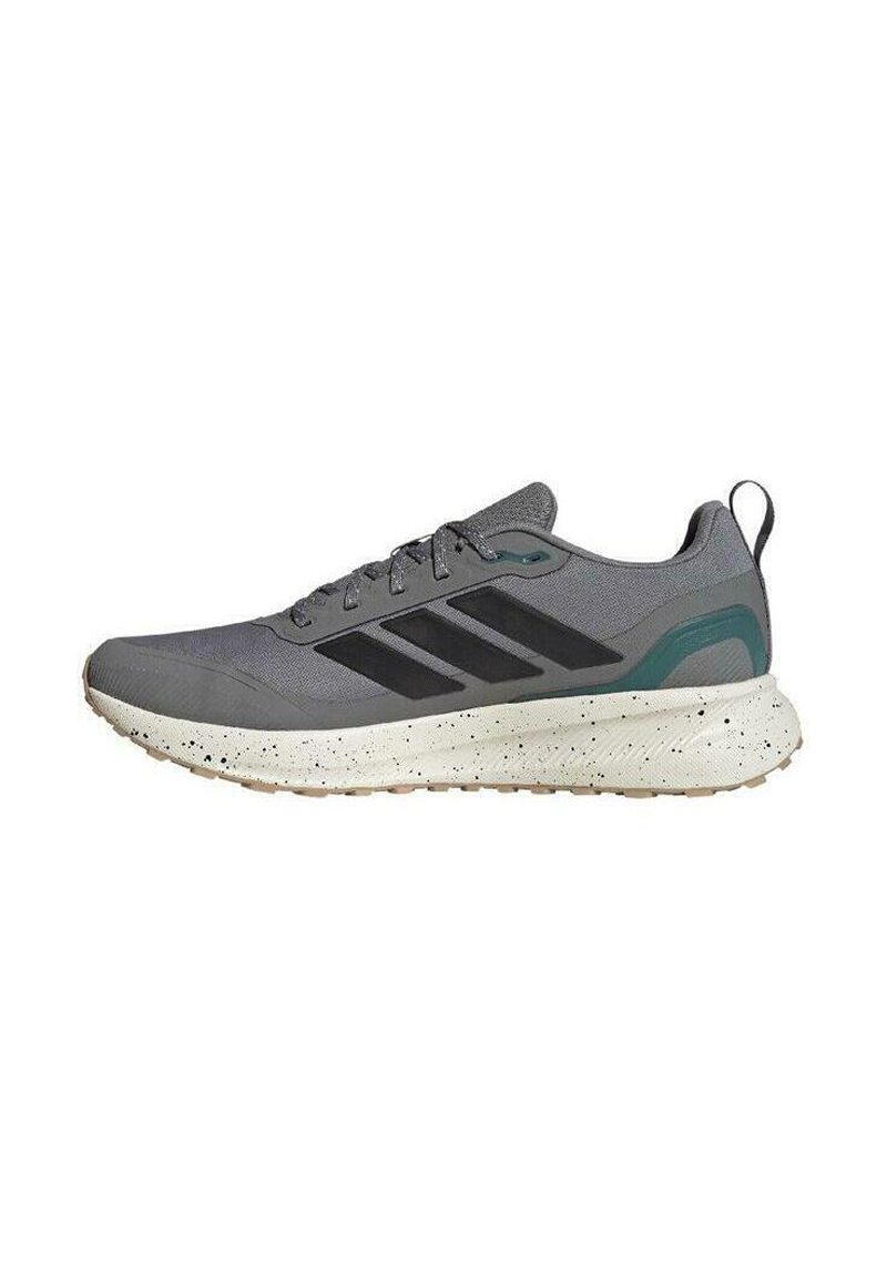 Zapatillas deportivas grises con acentos negros, parte superior de malla texturizada y una mediasuela blanca con manchas. Presenta una suela flexible y un tirador en el talón.