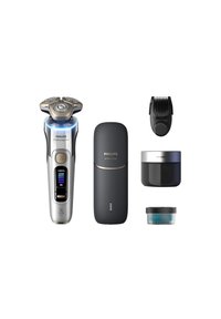 Rasoi elettrico con manico argentato, tre lame circolari, dettaglio LED blu e caricabatterie nero in dotazione, attacco per pettine e contenitori per crema.