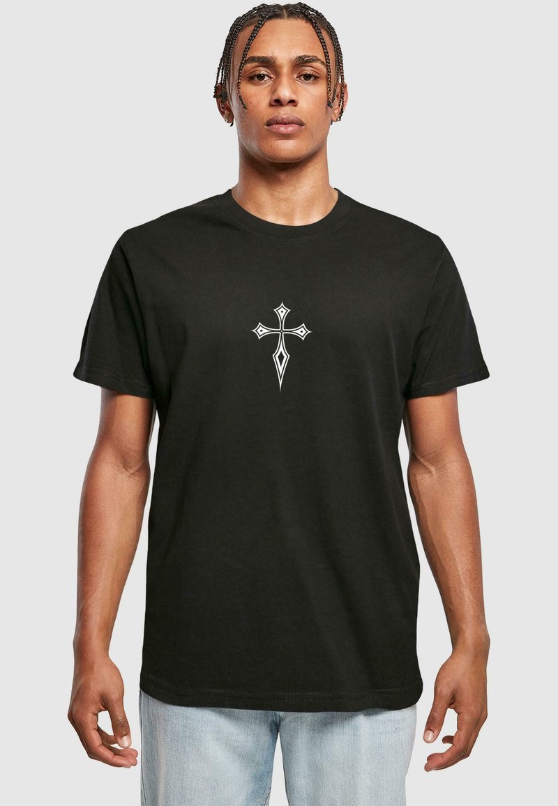 Black cotton t-shirt with short sleeves, featuring a white graphic of a cross on the chest. Simple design and classic fit.