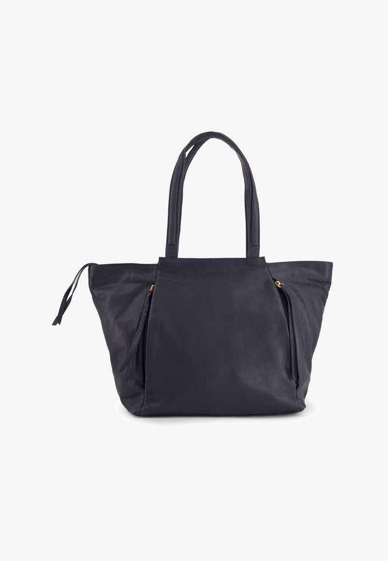 Navy leather tote bag with two front zippered pockets, two sturdy handles, and a smooth texture, featuring a subtle logo embossed on the front.