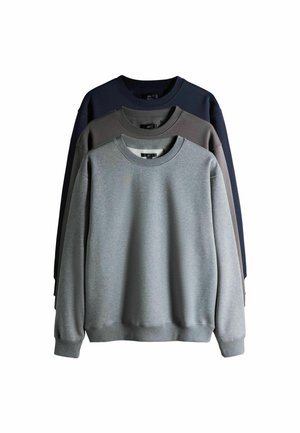 Drei Crewneck-Sweatshirts in Grau, Dunkelgrau und Marineblau. Aus weichem Stoff mit gerippten Bündchen und Saum, mit einem lässigen Schnitt.