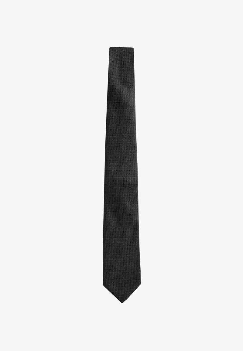 Cravate noire avec une finition texturée, s'affinant vers une pointe, présentant une couleur unie sans motifs ni accents.