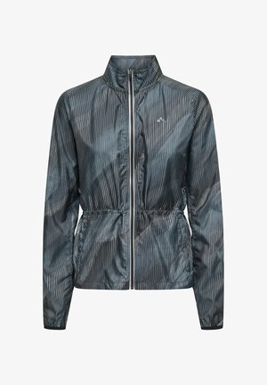 Veste coupe-vent légère avec un col montant, fermeture éclair à l'avant, rayures verticales noires et bleues, taille élastiquée et détail du logo.