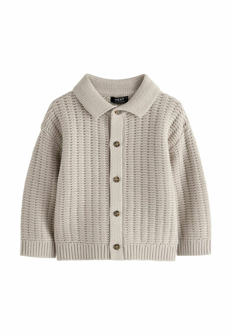 Beige knitted cardigan with a collared neck, featuring a textured woven pattern, ribbed cuffs, and a button-down front with brown buttons.