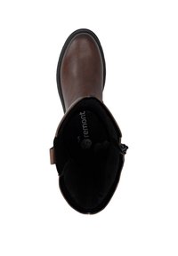 Brown leather ankle boot with a rounded toe, textured interior, and black sole. Features a side zip for easy wear and a subtle brand logo inside.