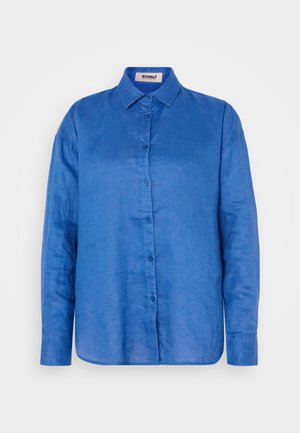 Niebieska lniana koszula z długim rękawem, z kołnierzykiem i zapięciem na guziki. Posiada luźny krój i gładką teksturę, z zaokrąglonym dołem.