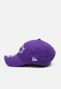 Purple baseball cap with curved brim, embroidered logo on front, and New Era logo on side. Cotton material, structured shape, six ventilation holes.