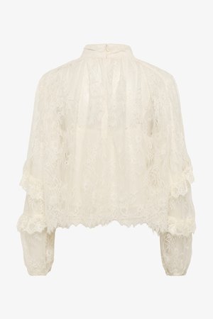 Ivory krāsas mežģīņu blūze ar garām piedurknēm un augstu kaklu, smalkiem ziedu rakstiem, volāniem uz piedurknēm un viļņainu apakšmalu.