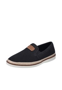 Zapato negro sin cordones con parte superior de malla, detalle en tono marrón en el collar y un detalle de yute trenzado a lo largo de la suela de goma blanca.