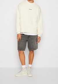 WRSTBHVR Felpa con zip - beige