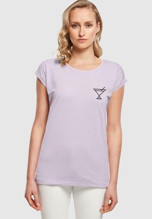 Lavender cotton t-shirt with short rolled sleeves and a black cocktail glass graphic on the left chest. Smooth texture, relaxed fit.