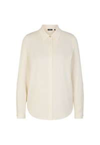 Camicia a maniche lunghe color crema con colletto appuntito, realizzata in tessuto liscio con una leggera lucentezza, orlo arrotondato e polsini con un solo bottone.