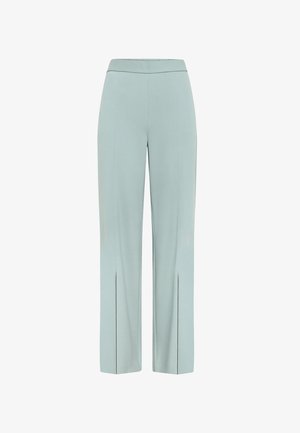 Pantalon large pour femme bleu clair avec fentes avant et ceinture plate, présenté sur un fond blanc.