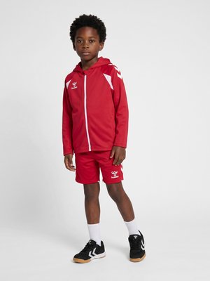 Hummel, HUMMEL HMLCORE 2.0 ZIP HOODIE KIDS UNISEX - Veste de survêtement - true red white