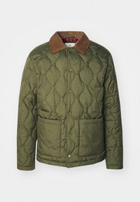 Green quilted jacket with a brown corduroy collar, snap button closure, and two front pockets. Features a patterned interior lining.