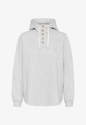 Helehall põhimõte, millel on nööriga kapuuts, nööpidega esikülg ja pikad varrukad. Valmistatud pehmest materjalist ja vaba lõikega.