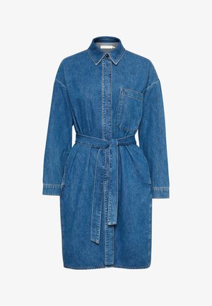 Denimkleit nupuväärse eesmise, krae, pikkade varrukate ja vöödega. Omab ühte rinnataskut ja lahedat lõiget. Sinine värv.