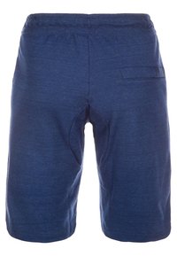 Mörkblå knälånga shorts med elastisk midja och en liten rektangulär bakficka på högra sidan.
