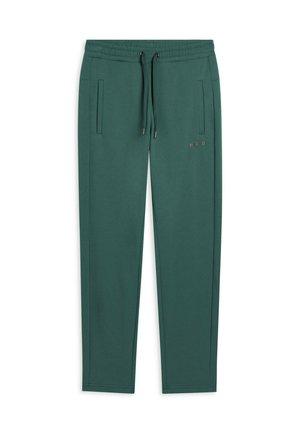 Pantaloni sportivi verdi a gamba affusolata con vita elasticizzata, coulisse, tasche laterali e piccolo logo "FREDDY" sulla coscia sinistra.