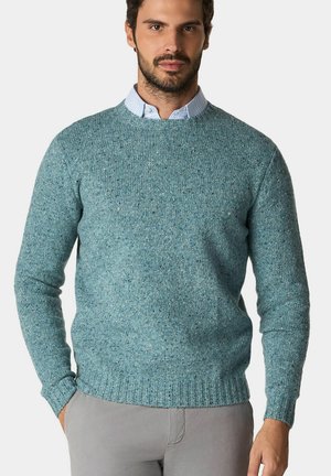 Lichtblauwe textuurgebreide trui met lange mouwen en een ronde halslijn, voorzien van een geribbelde zoom en boorden.