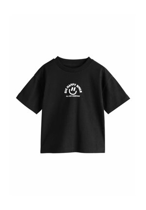 Black short-sleeve T-shirt with white smiley face graphic and text "BIG HAPPY SMILE ALL DAY-EVERYDAY" centered on the chest.