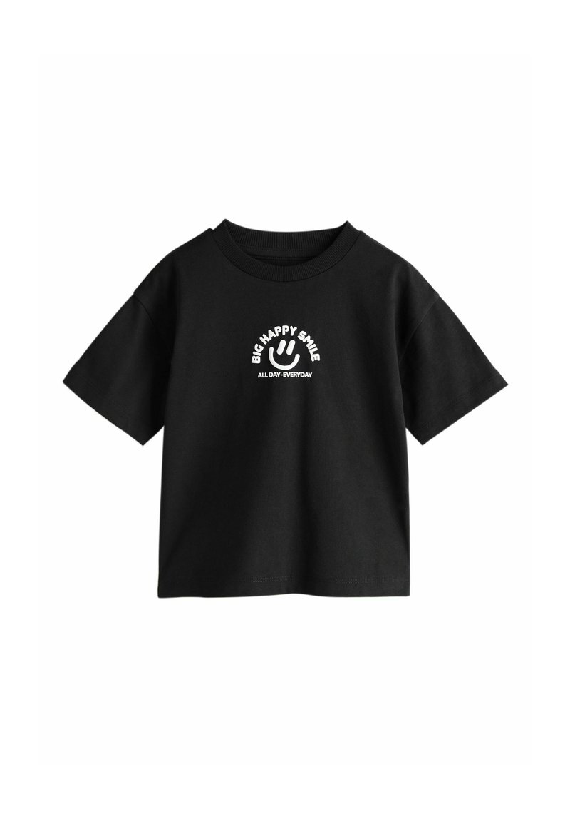Black short-sleeve T-shirt with white smiley face graphic and text "BIG HAPPY SMILE ALL DAY-EVERYDAY" centered on the chest.