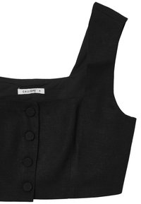 Top corto in lino nero con spalline larghe, bottoni frontali e un design strutturato. Etichetta con la scritta "CALLIOPE S." Texture liscia e opaca.