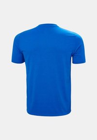 Camiseta azul de manga corta con cuello redondo y una textura de algodón suave, mostrada desde la parte de atrás sin elementos de diseño visibles.