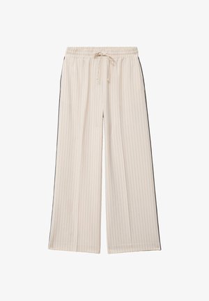 Pantaloni a gamba larga color crema con sottili righe verticali, vita elastica e coulisse frontale, con strisce laterali nere.