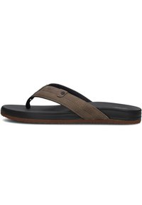 Brown leather thong sandal with perforated accents, black rubber sole, and flat footbed. Features a simple design suitable for casual wear.