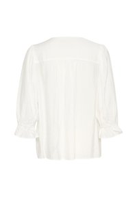 White blouse with long, puff sleeves and a ruffled hem. Features a loose fit and gathered back design, made from lightweight fabric.