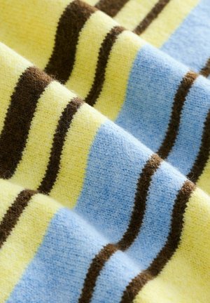 Raidallinen tekstiili, jossa on vuorotellen keltaisia, vaaleansinisiä ja tummanruskeita viivoja. Pehmeä, teksturoitu kangas, jonka ulkonäkö on kodikas.