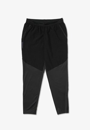 Black athletic pants with a tapered fit, featuring lighter black panels and side zip pockets. Made from smooth, stretchy fabric.
