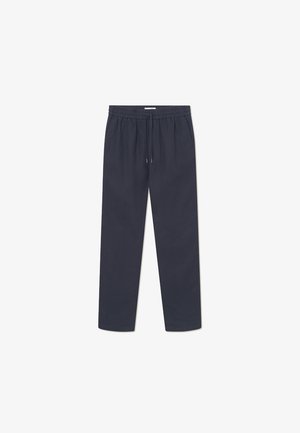Navy blue jogger pants with an elastic waistband and adjustable drawstring, featuring side pockets and a relaxed fit. Smooth fabric texture.