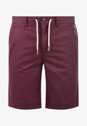 Bordo šortai su plokščiu priekiu, šoninėmis kišenėmis, raišteliu liemeniui ir mažą logotipo etiketę šalia liemens. Pagaminti iš medvilnės mišinio.